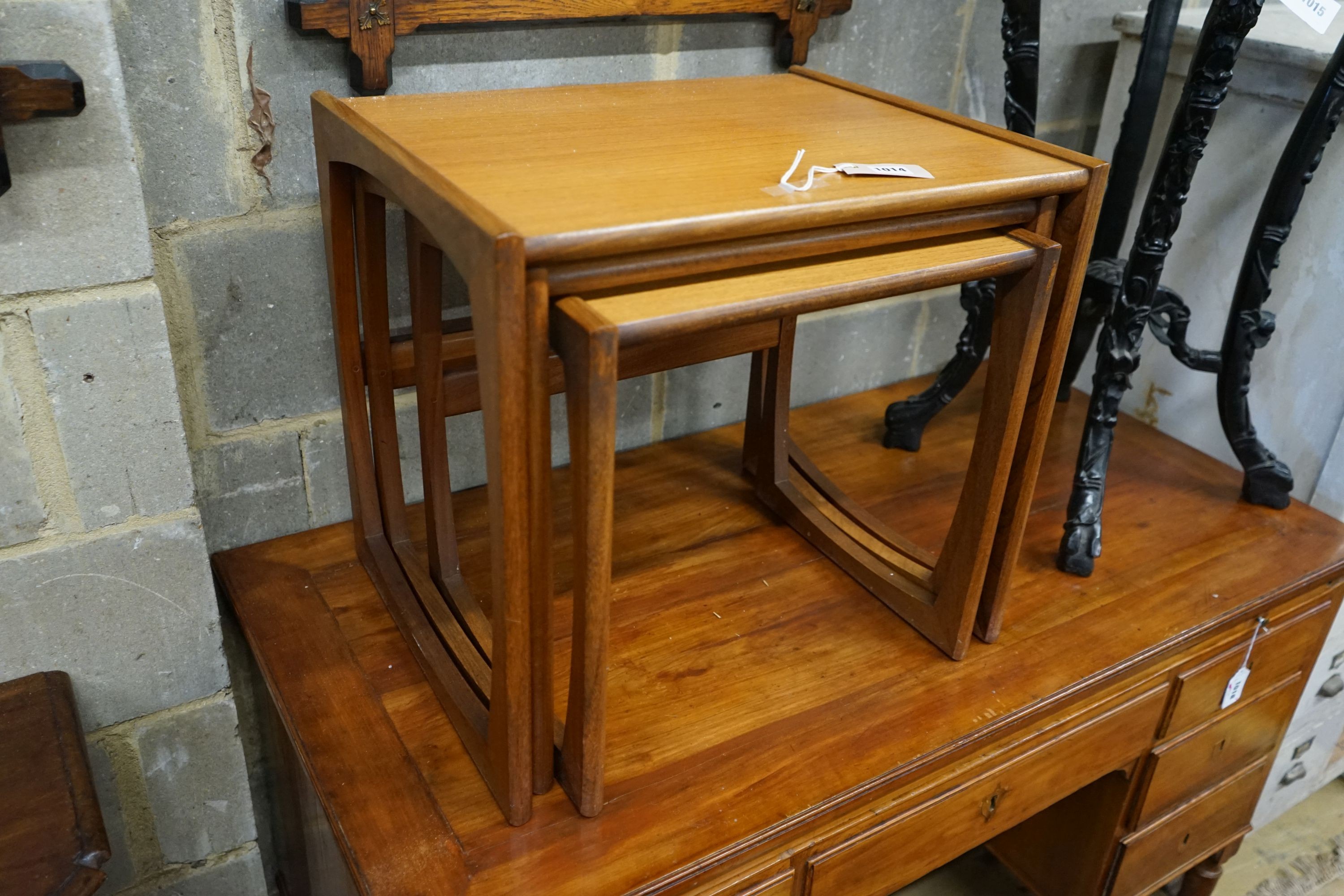 A nest of three rectangular G Plan teak tea tables, width 53cm, depth 43cm, height 48cm
